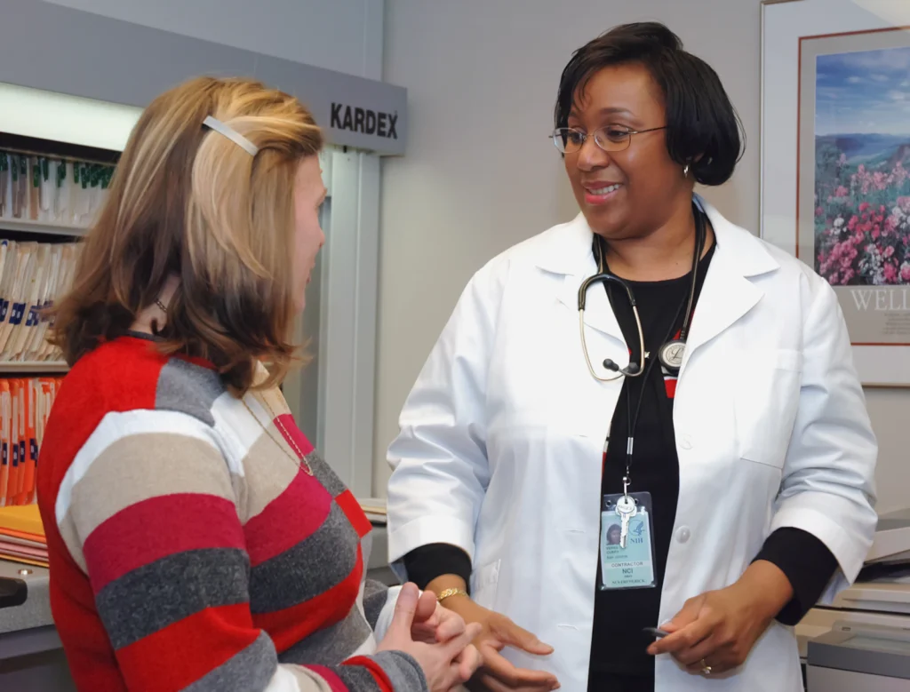 Physician in conversation with a patient
